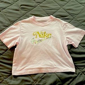 A pink Nike crop top